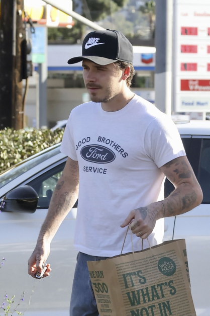 Brooklyn Beckham covers tattoo dedicated to dad David in latest blow to family